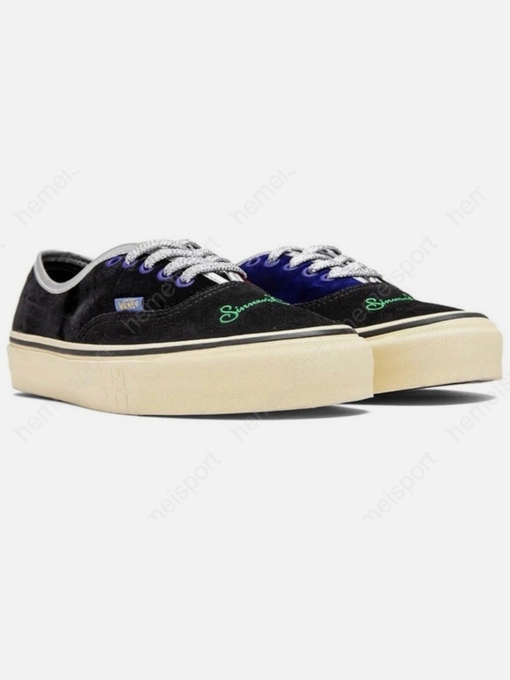 Vans Black Suede Low-Top Sneakers with Cream Sole and Blue Accent